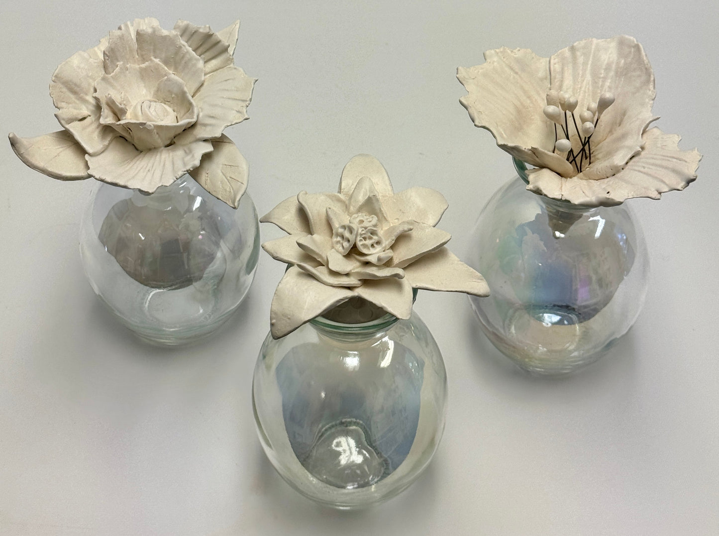 Ceramic Flowers on Iridescent Vases by Gail Williams